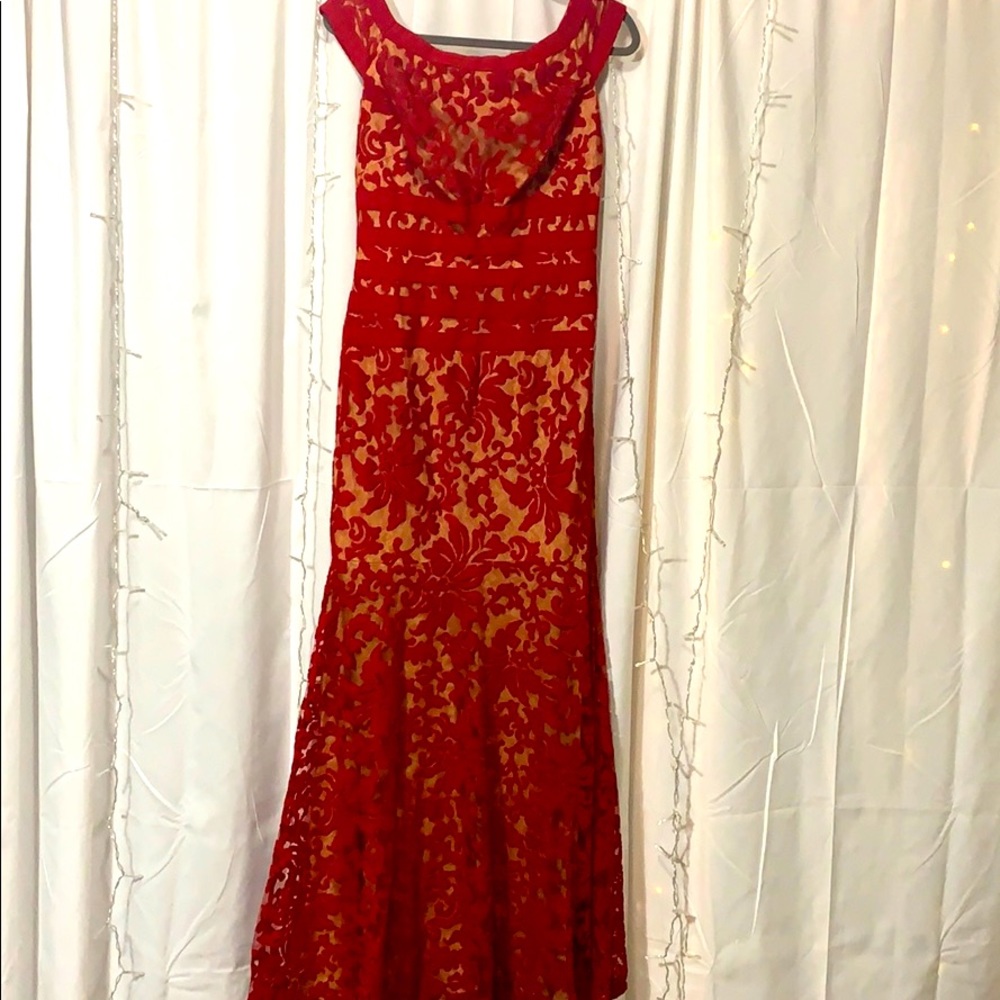 Deep read, lace overlay, fit and flare gown